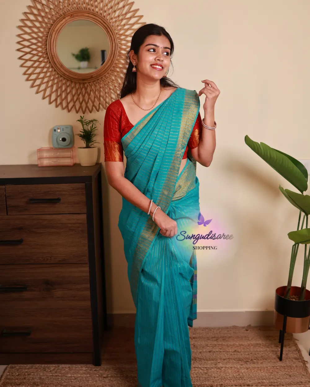 Sky blue saree with red blouse